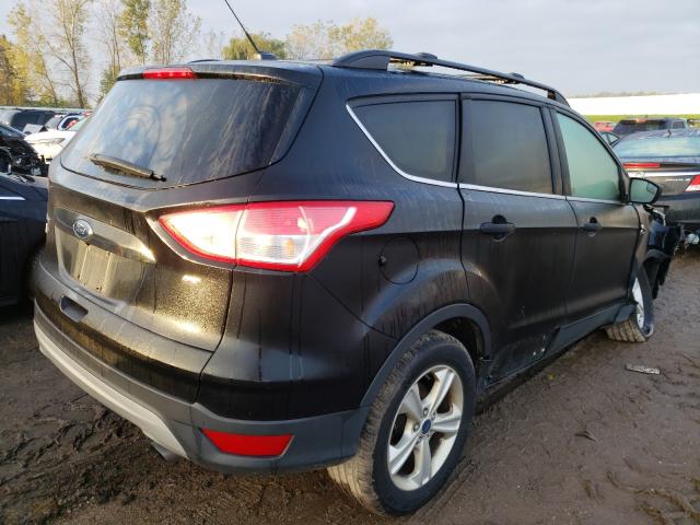 Photo 4 from auction – 2016 FORD ESCAPE SE with VIN 1FMCU0G77GUA08714