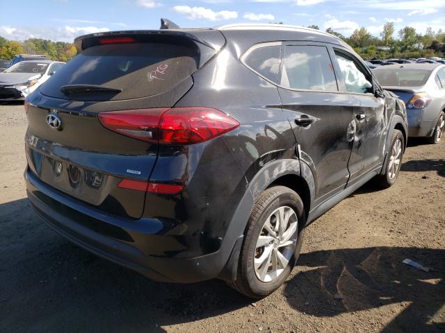 Photo 4 from auction – 2020 HYUNDAI TUCSON LIM with VIN KM8J3CA45LU126006