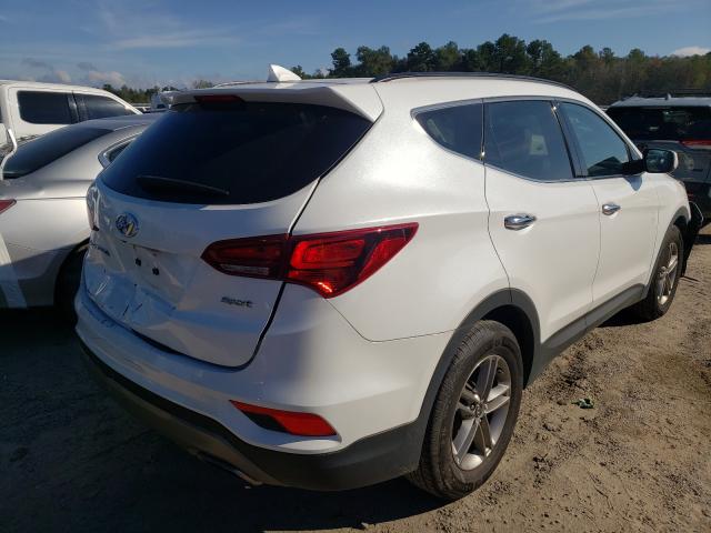 Photo 4 from auction – 2017 HYUNDAI SANTA FE S with VIN 5NMZU3LB0HH037118