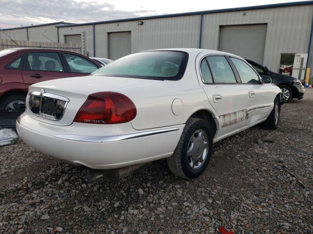 Photo 4 from auction – 2002 LINCOLN CONTINENTA with VIN 1LNHM97VX2Y621193
