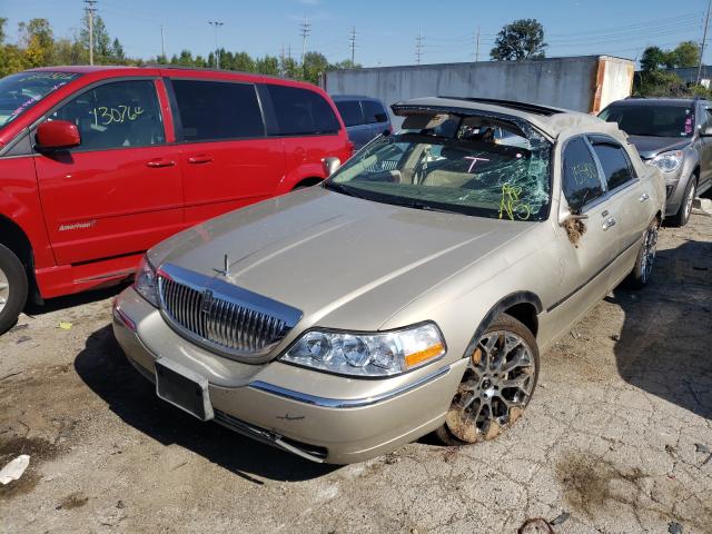 Photo 2 from auction – 2004 LINCOLN TOWN CAR E with VIN 1LNHM81W04Y612033