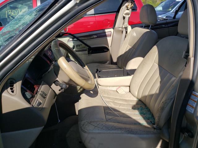 Photo 5 from auction – 2004 LINCOLN TOWN CAR E with VIN 1LNHM81W04Y612033
