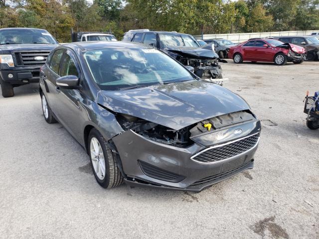 FORD FOCUS SE 2017 with VIN 1FADP3K21HL218879 - Photo from auction