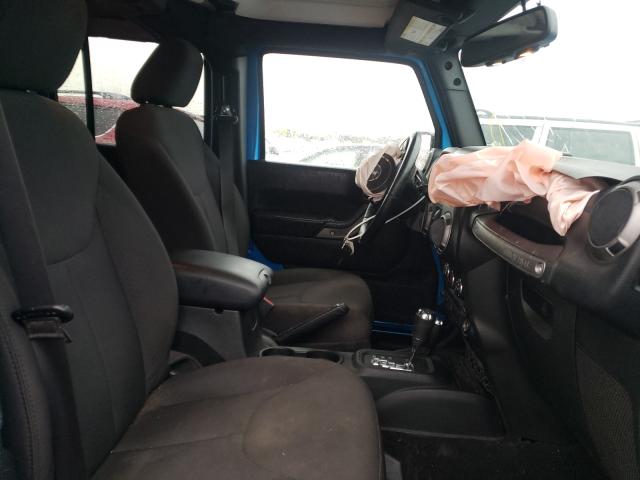 Photo 5 from auction – 2015 JEEP WRANGLER U with VIN 1C4BJWDG7FL528772