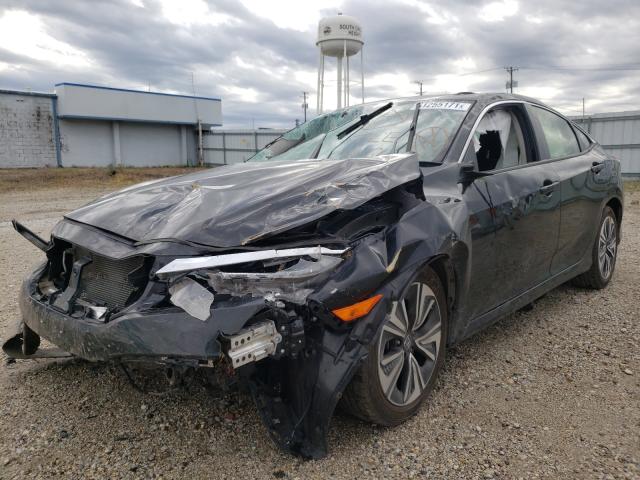 Photo 2 from auction – 2018 HONDA CIVIC EX with VIN JHMFC1F39JX014415