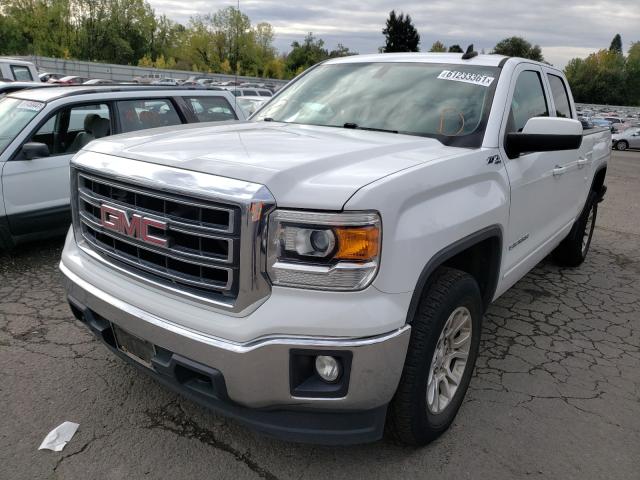 Photo 2 from auction – 2015 GMC SIERRA K15 with VIN 1GTV2UEC8FZ447853