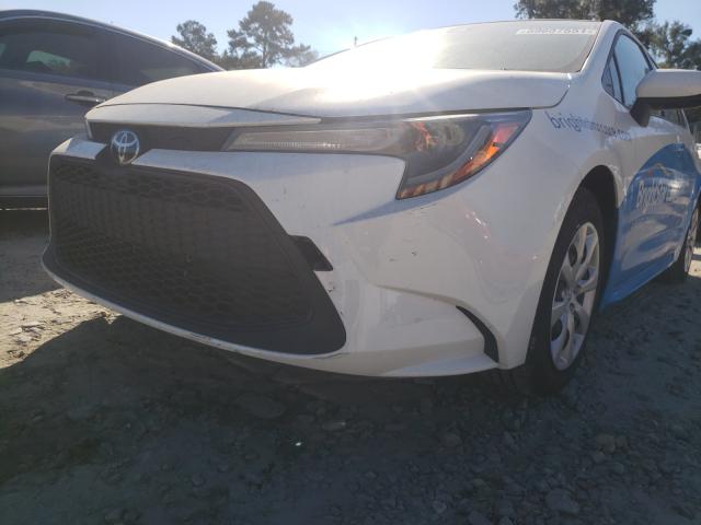 Photo 9 from auction – 2021 TOYOTA COROLLA LE with VIN JTDEPMAE0MJ172323
