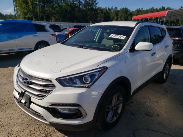 Photo 2 from auction – 2017 HYUNDAI SANTA FE S with VIN 5NMZU3LB0HH037118