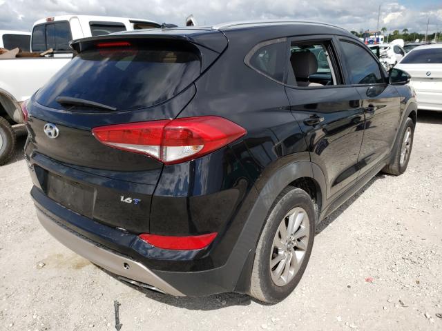 Photo 4 from auction – 2016 HYUNDAI TUCSON LIM with VIN KM8J33A25GU166946