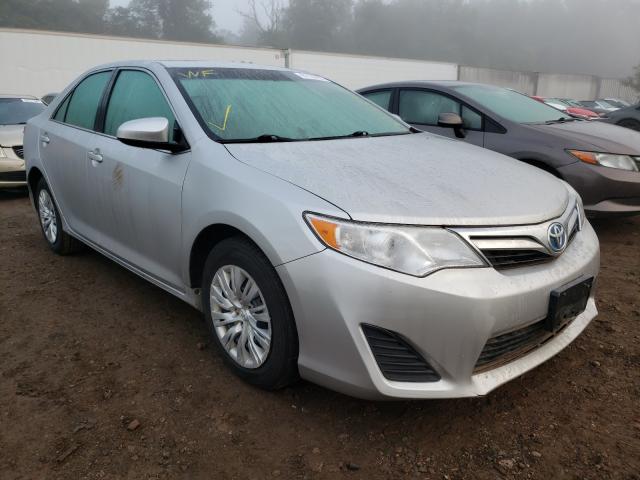 TOYOTA CAMRY HYBR 2014 with VIN 4T1BD1FK2EU132927 - Photo from auction