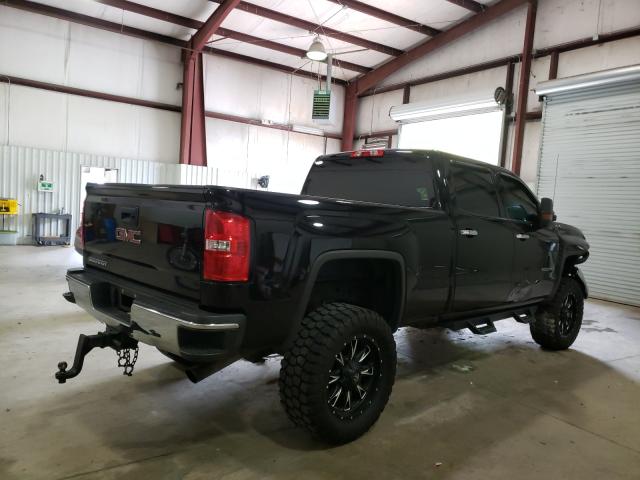 Photo 4 from auction – 2017 GMC SIERRA K25 with VIN 1GT12REG3HF171617