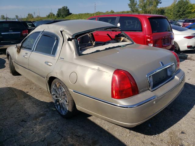 Photo 3 from auction – 2004 LINCOLN TOWN CAR E with VIN 1LNHM81W04Y612033