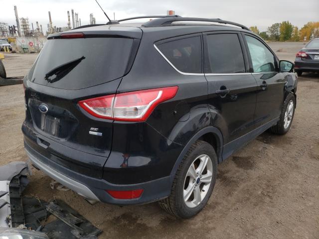 Photo 4 from auction – 2014 FORD ESCAPE SE with VIN 1FMCU9GX0EUD11772