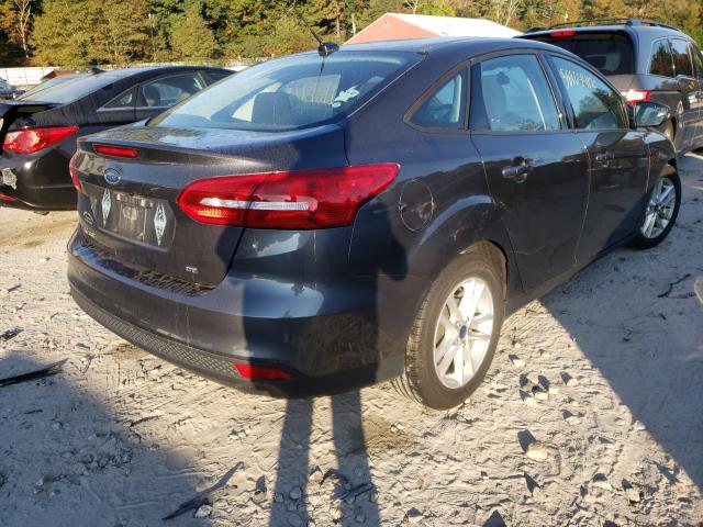 Photo 4 from auction – 2015 FORD FOCUS SE with VIN 1FADP3F28FL291223