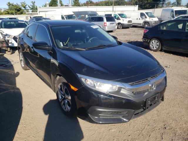 HONDA CIVIC LX 2018 with VIN 2HGFC2F51JH521565 - Photo from auction