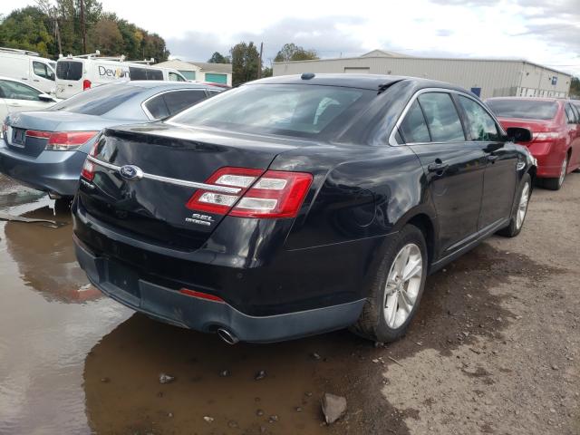 Photo 4 from auction – 2014 FORD TAURUS SEL with VIN 1FAHP2E8XEG168564
