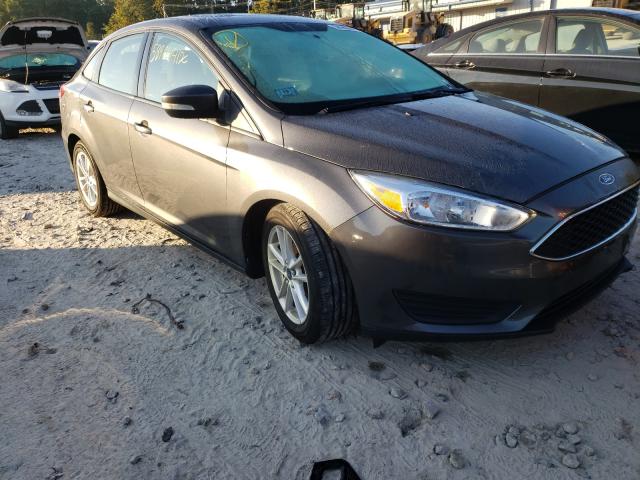 FORD FOCUS SE 2015 with VIN 1FADP3F28FL291223 - Photo from auction