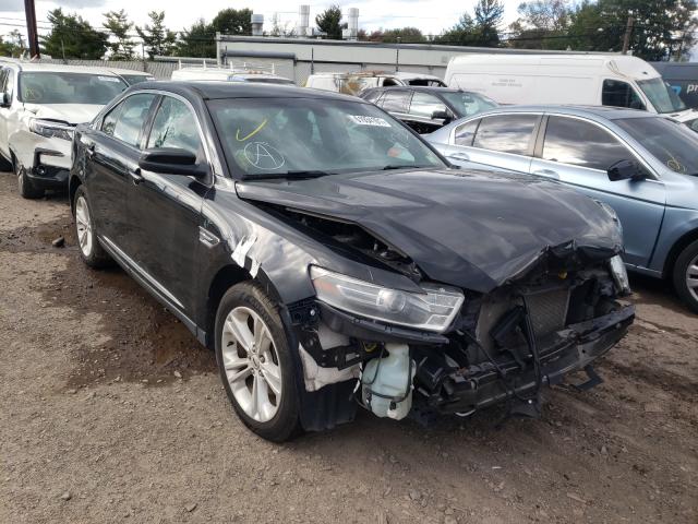 FORD TAURUS SEL 2014 with VIN 1FAHP2E8XEG168564 - Photo from auction