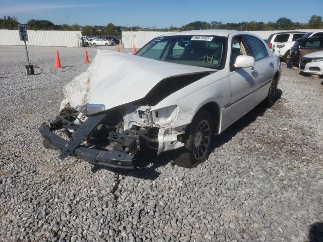 Photo 2 from auction – 2001 LINCOLN TOWN CAR E with VIN 1LNHM81W41Y728136