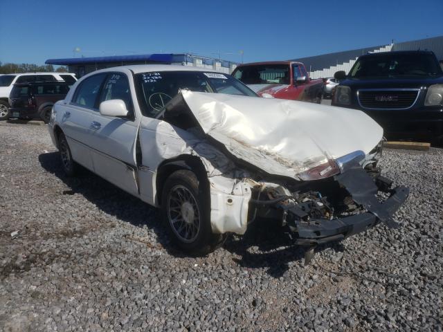 LINCOLN TOWN CAR E 2001 with VIN 1LNHM81W41Y728136 - Photo from auction