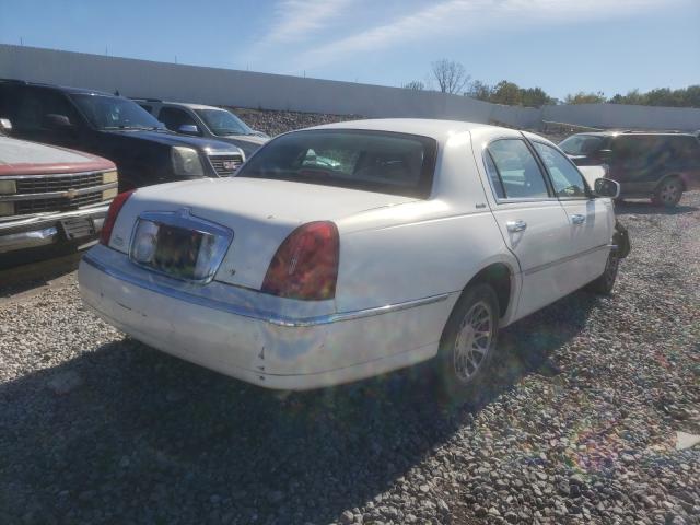 Photo 4 from auction – 2001 LINCOLN TOWN CAR E with VIN 1LNHM81W41Y728136