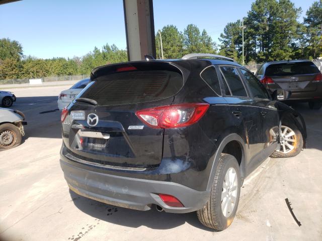 Photo 4 from auction – 2014 MAZDA CX-5 SPORT with VIN JM3KE2BE3E0377371