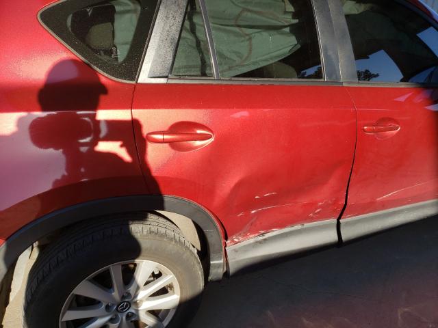 Photo 9 from auction – 2013 MAZDA CX-5 SPORT with VIN JM3KE4BE4D0166108
