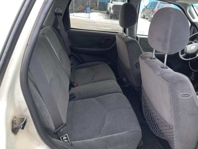 Photo 6 from auction – 2003 MAZDA TRIBUTE LX with VIN 4F2CZ94173KM01810