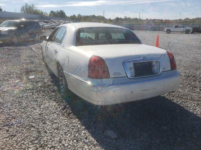 Photo 3 from auction – 2001 LINCOLN TOWN CAR E with VIN 1LNHM81W41Y728136
