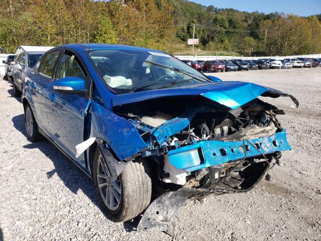 FORD FOCUS SE 2016 with VIN 1FADP3F29GL402704 - Photo from auction