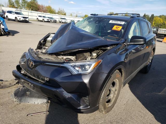 Photo 2 from auction – 2017 TOYOTA RAV4 LE with VIN JTMBFREV9HJ174087