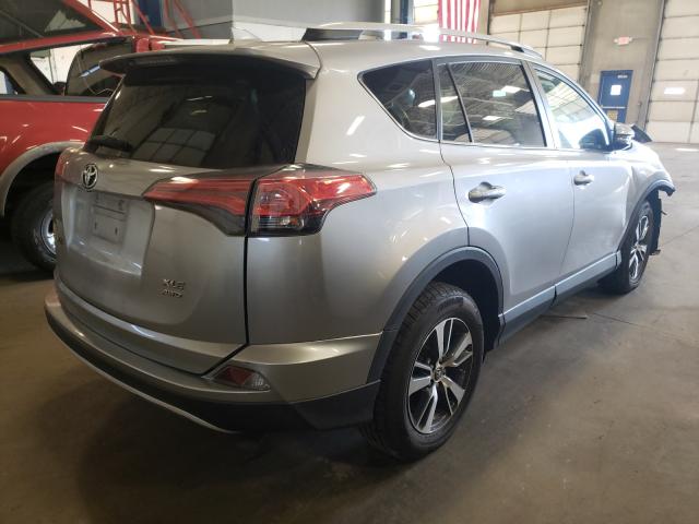 Photo 4 from auction – 2016 TOYOTA RAV4 XLE with VIN 2T3RFREV9GW497800