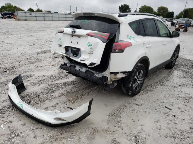 Photo 4 from auction – 2017 TOYOTA RAV4 LE with VIN JTMBFREV0HJ120662
