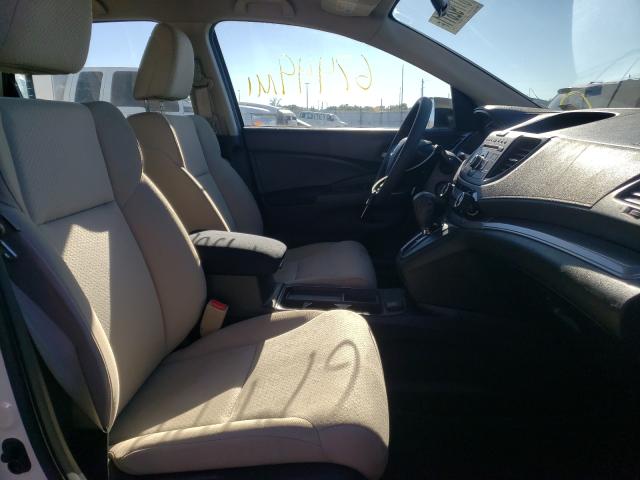 Photo 5 from auction – 2015 HONDA CR-V LX with VIN 5J6RM4H34FL041430