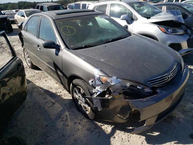 TOYOTA CAMRY LE 2005 with VIN 4T1BF30K55U592758 - Photo from auction