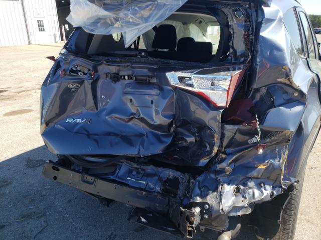 Photo 9 from auction – 2014 TOYOTA RAV4 LE with VIN JTMBFREV4ED054157