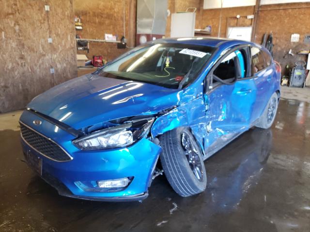 Photo 2 from auction – 2015 FORD FOCUS SE with VIN 1FADP3K28FL312190