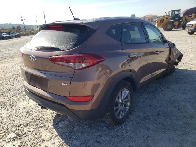 Photo 4 from auction – 2017 HYUNDAI TUCSON LIM with VIN KM8J3CA42HU550816