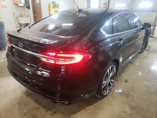 Photo 4 from auction – 2017 FORD FUSION TIT with VIN 3FA6P0K97HR120588