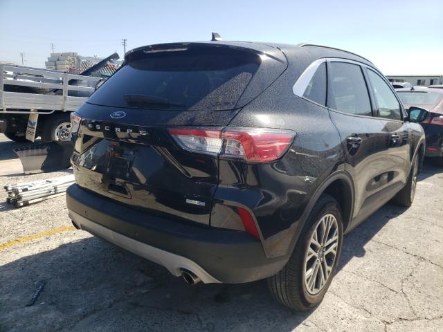 Photo 4 from auction – 2020 FORD ESCAPE SEL with VIN 1FMCU9H64LUB22951
