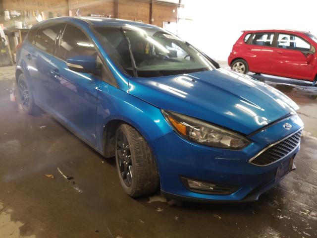 FORD FOCUS SE 2015 with VIN 1FADP3K28FL312190 - Photo from auction