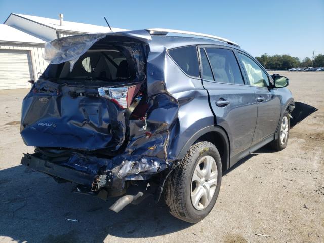 Photo 4 from auction – 2014 TOYOTA RAV4 LE with VIN JTMBFREV4ED054157