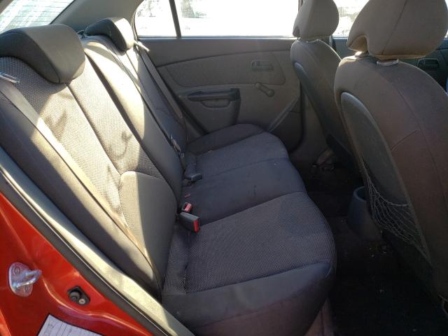 Photo 6 from auction – 2011 KIA RIO BASE with VIN KNADH4A34B6940969