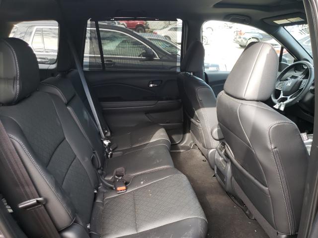 Photo 6 from auction – 2020 HONDA PASSPORT E with VIN 5FNYF8H55LB011274