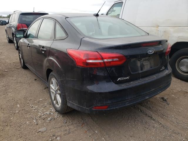 Photo 3 from auction – 2016 FORD FOCUS SE with VIN 1FADP3F24GL315373