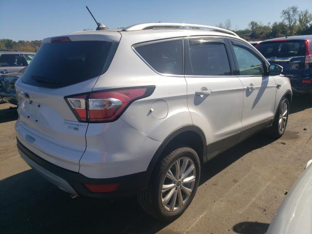 Photo 4 from auction – 2018 FORD ESCAPE TIT with VIN 1FMCU9J94JUB18688