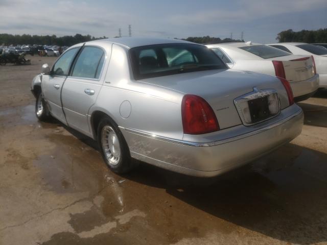 Photo 3 from auction – 1998 LINCOLN TOWN CAR E with VIN 1LNFM81W0WY693609