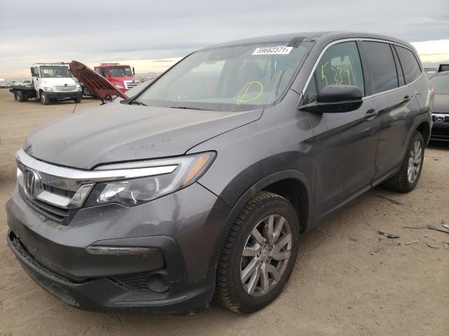 Photo 2 from auction – 2020 HONDA PILOT LX with VIN 5FNYF5H18LB022992