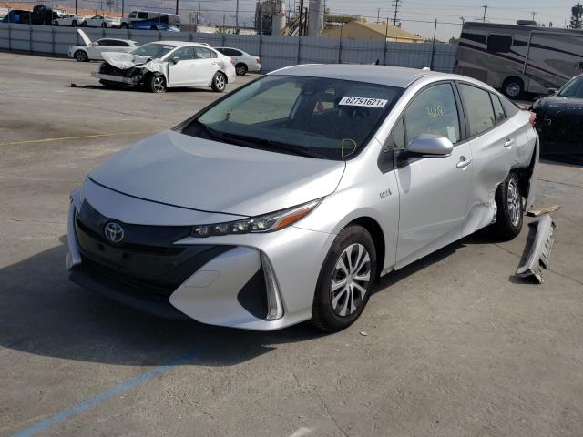 Photo 2 from auction – 2021 TOYOTA PRIUS PRIM with VIN JTDKAMFP0M3165374