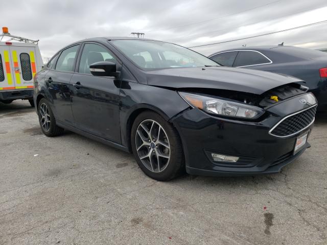 FORD FOCUS SEL 2018 with VIN 1FADP3H2XJL233880 - Photo from auction